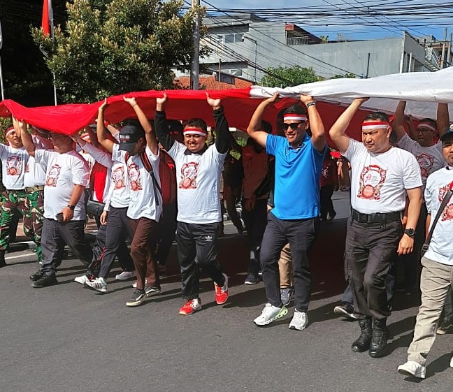 Semangat Nasionalisme, Pemuda LDII Kota Kediri Turut Serta Kirab Merah Putih Raksasa