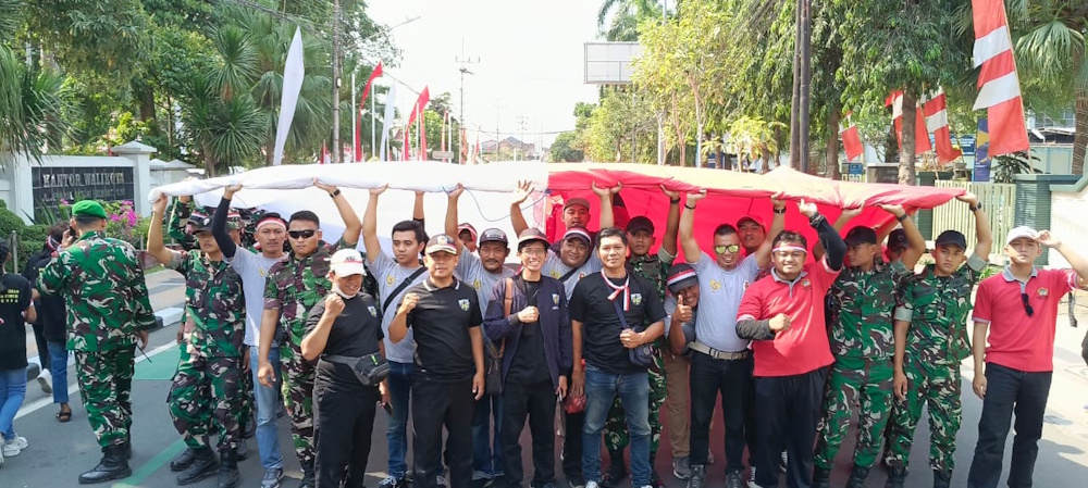 Pemuda LDII Ikuti Kirab Bendera Raksasa Merah Putih, Ini Kata Mbak Wali
